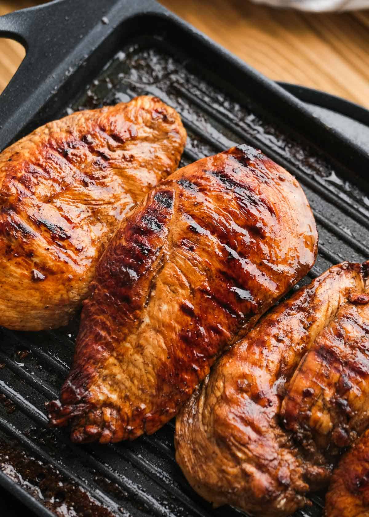 overhead image of chicken being grilled