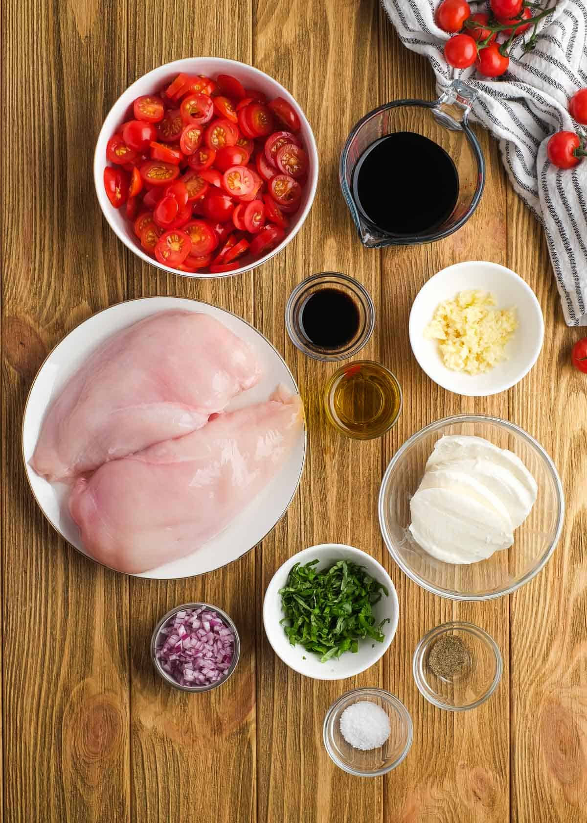 bruschetta chicken ingredients on a wooden table