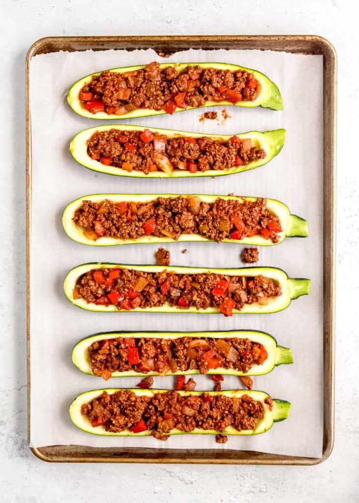 zucchini boats stuffed with beef enchilada veggie mixture