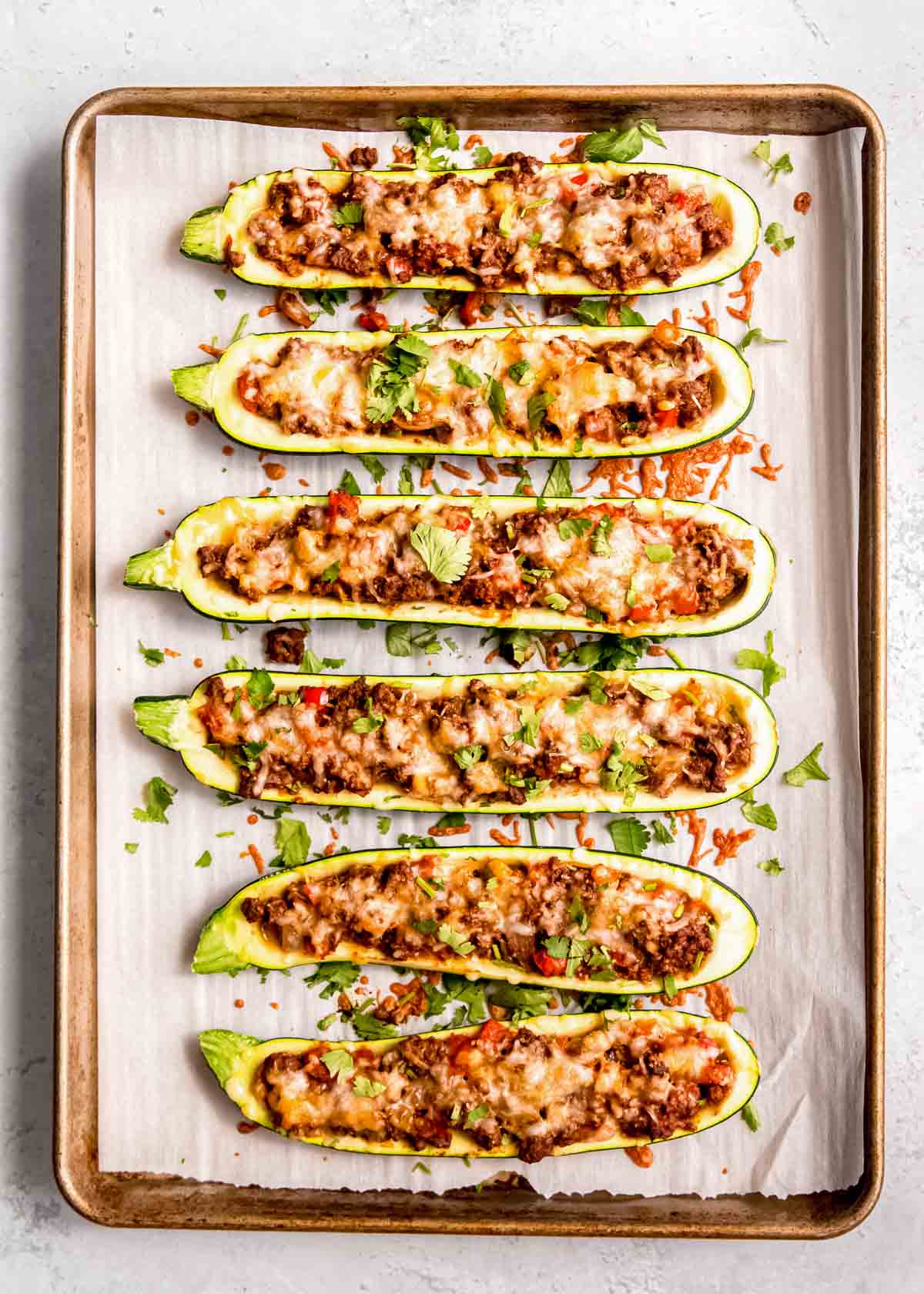 cooked enchilada zucchini boats topped with fresh cilantro