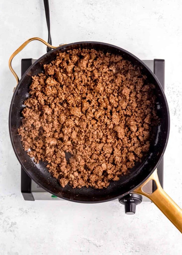 seasoned ground beef browned in a skillet