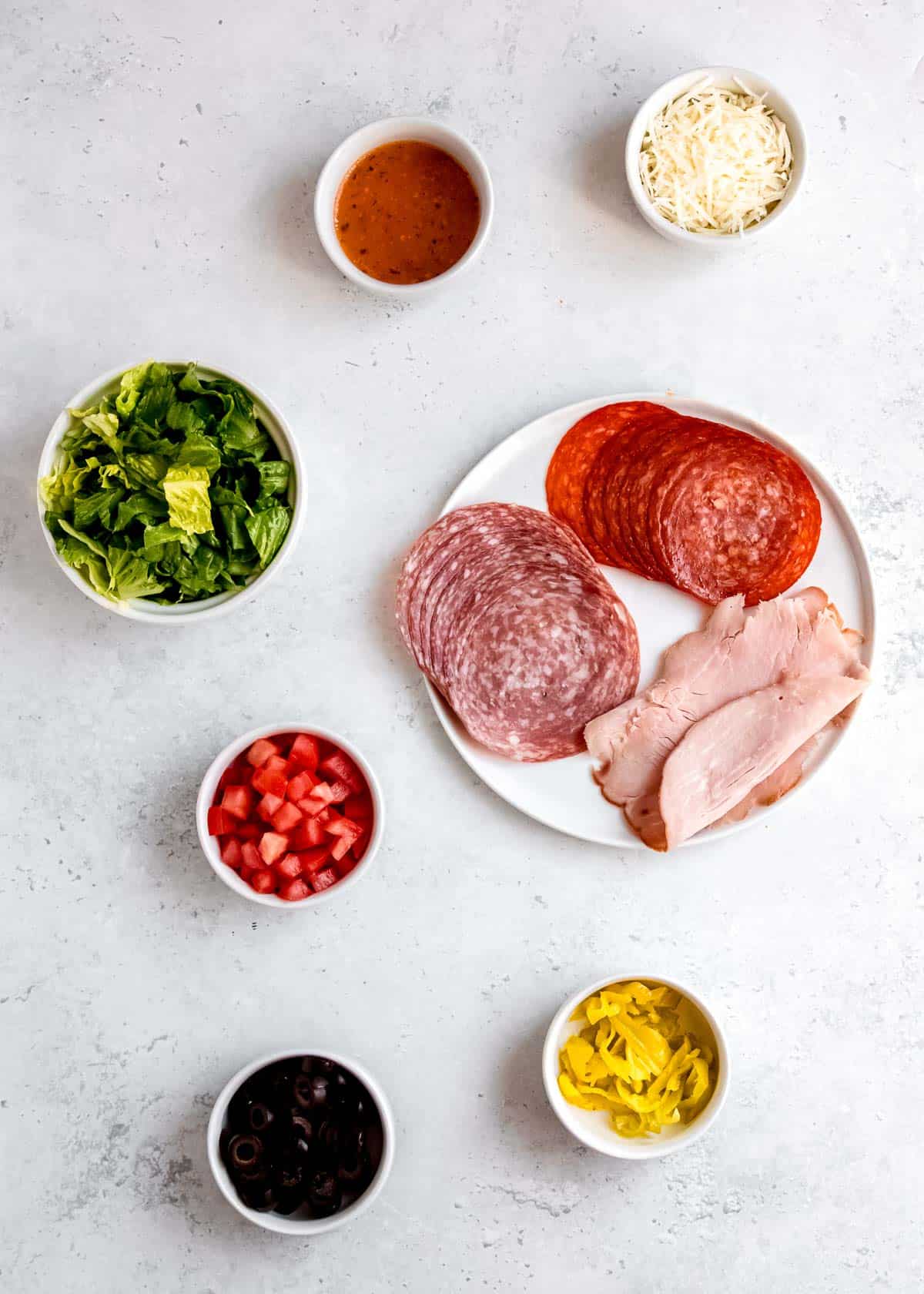 italian sub in a tub ingredients on a white table