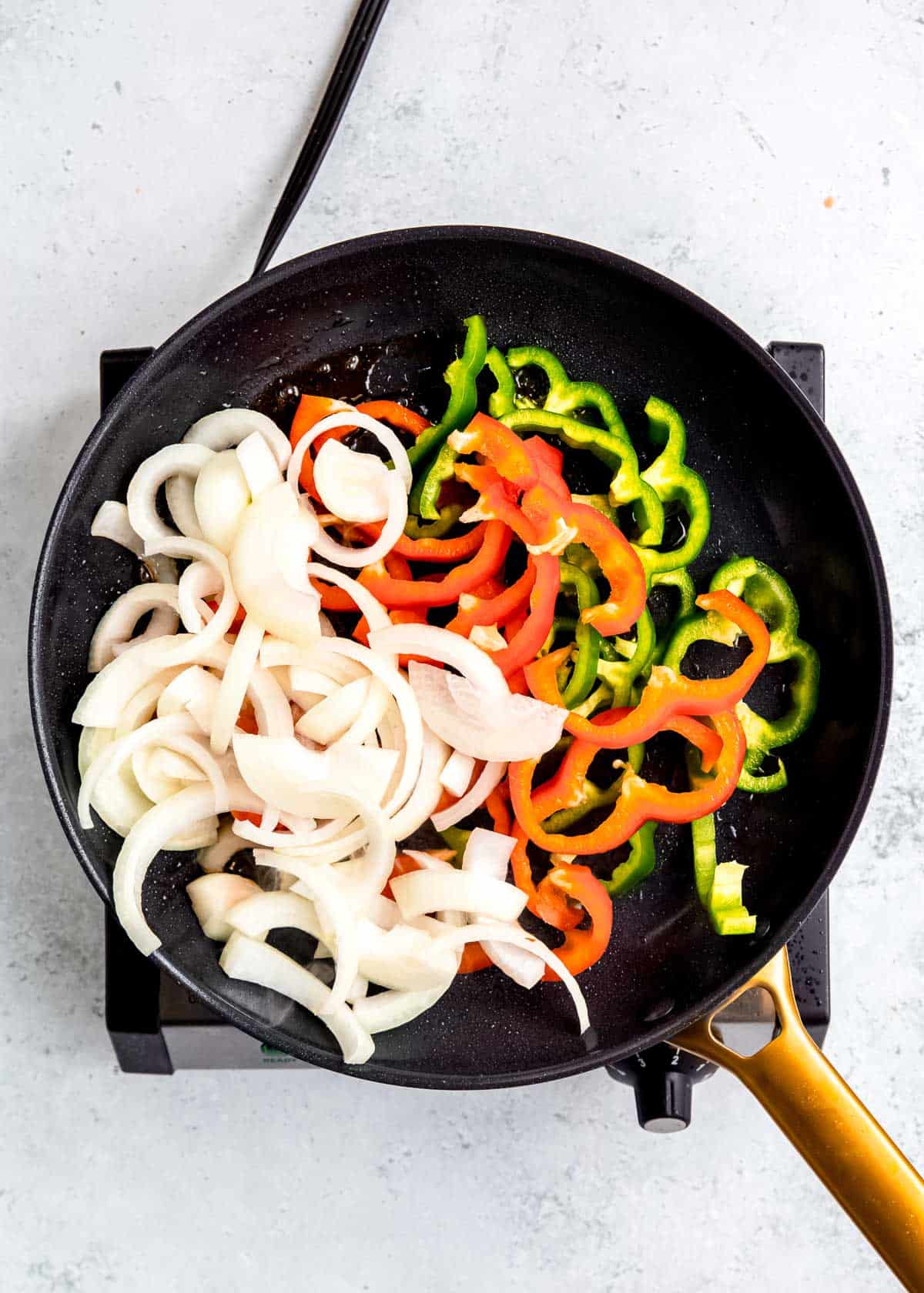 vegetables being sauteed in skillet