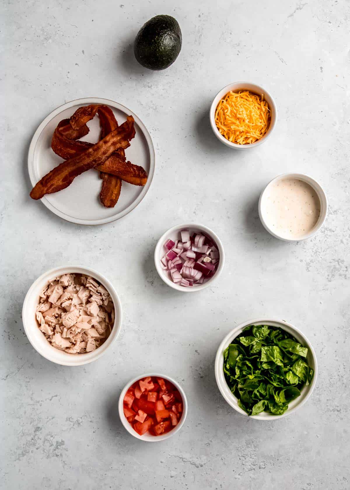 turkey bacon sub in a tub ingredients on a white table