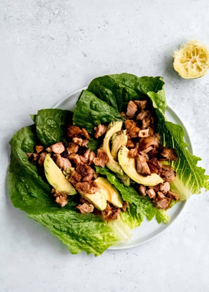 chicken and avocado on lettuce leaves