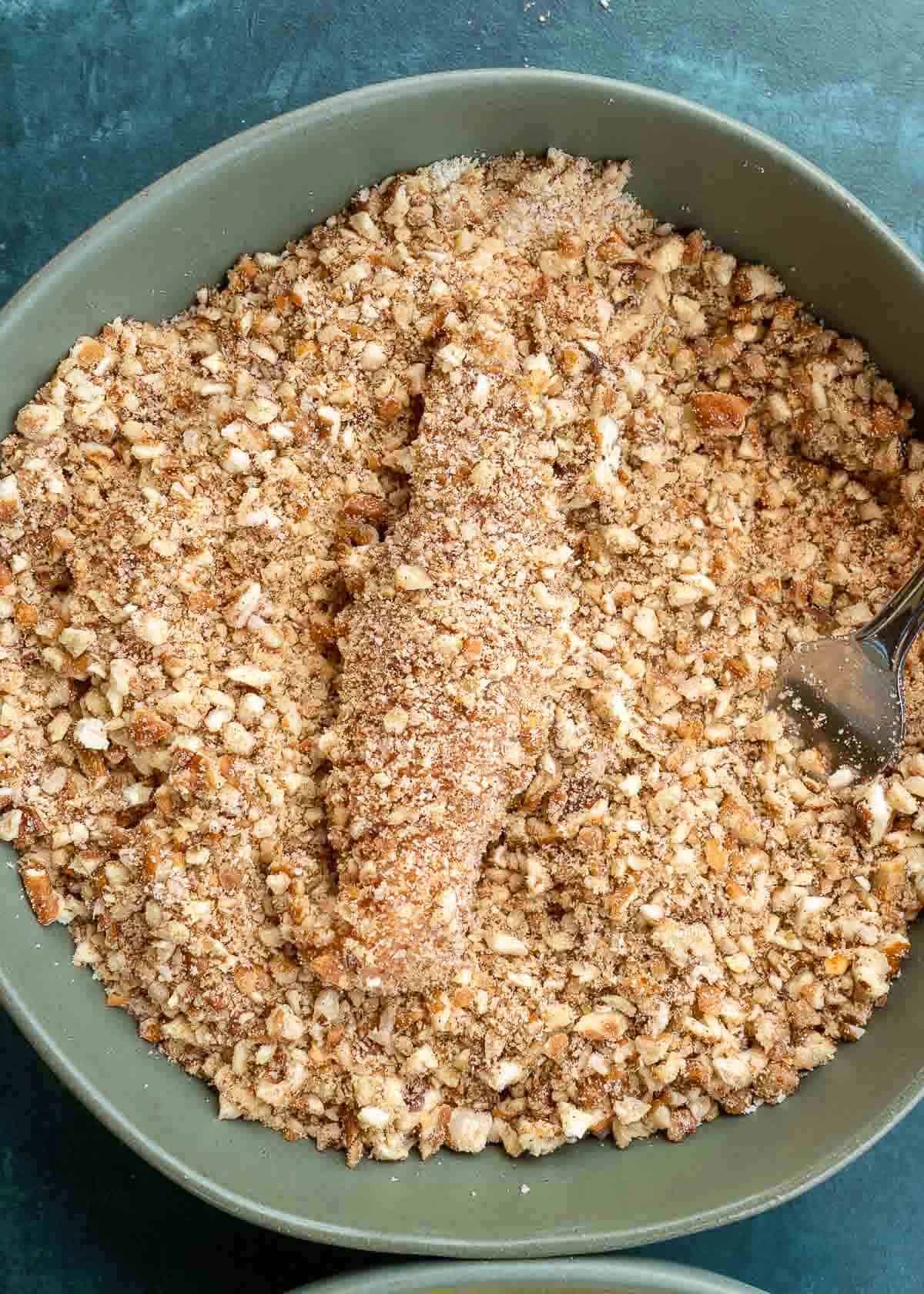 chicken strip coated in a pecan almond flour mixture