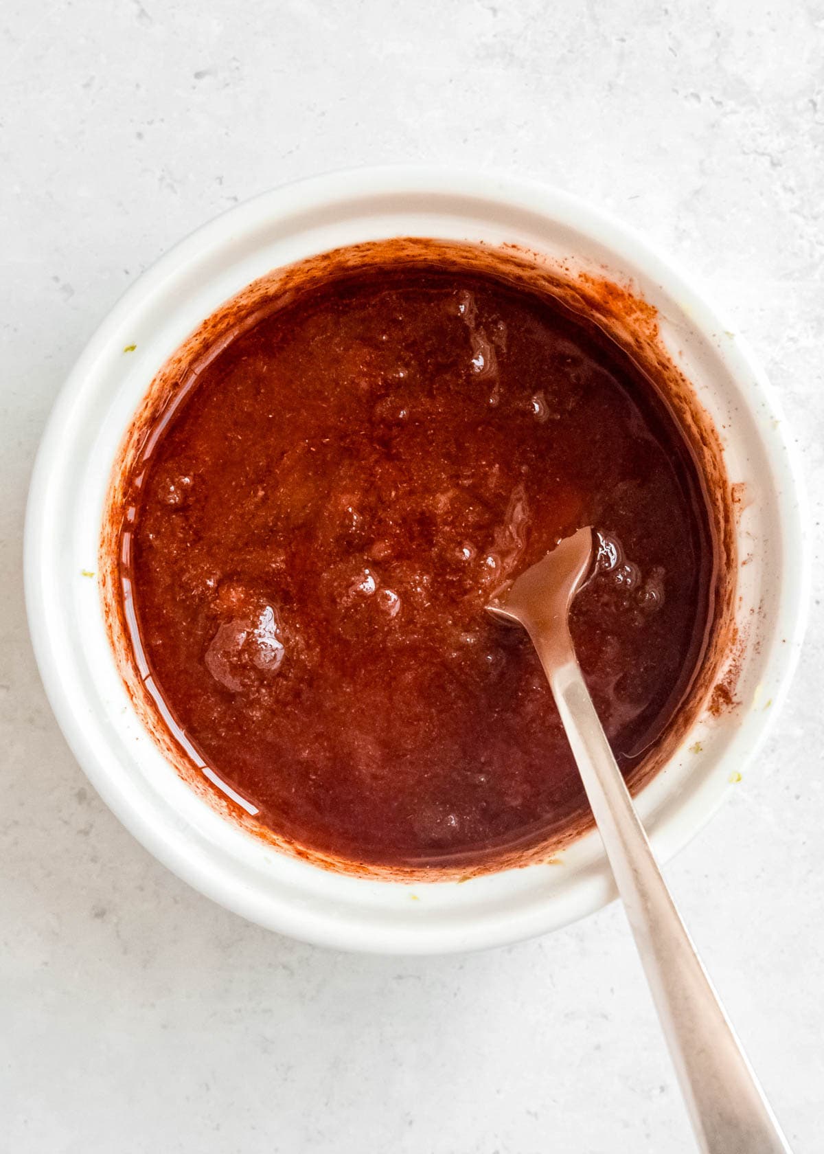 chipotle marinade ingredients mixed in a white bowl