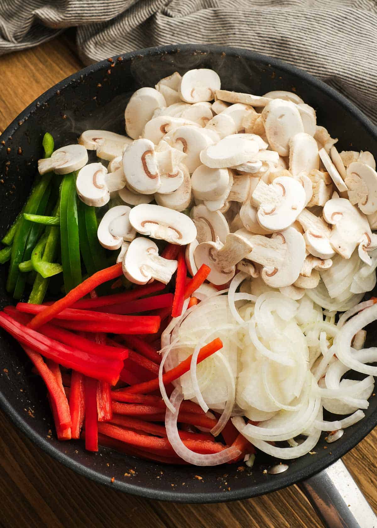 overhead image of veggies in cast iron skillet