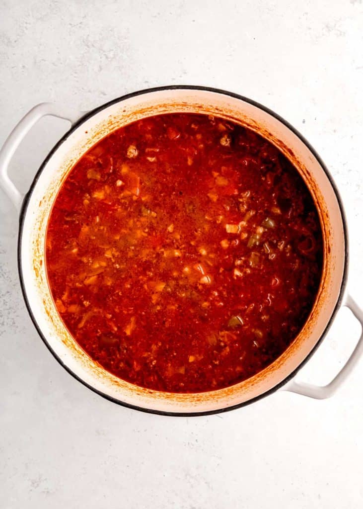 overhead image of taco soup simmering in dutch oven