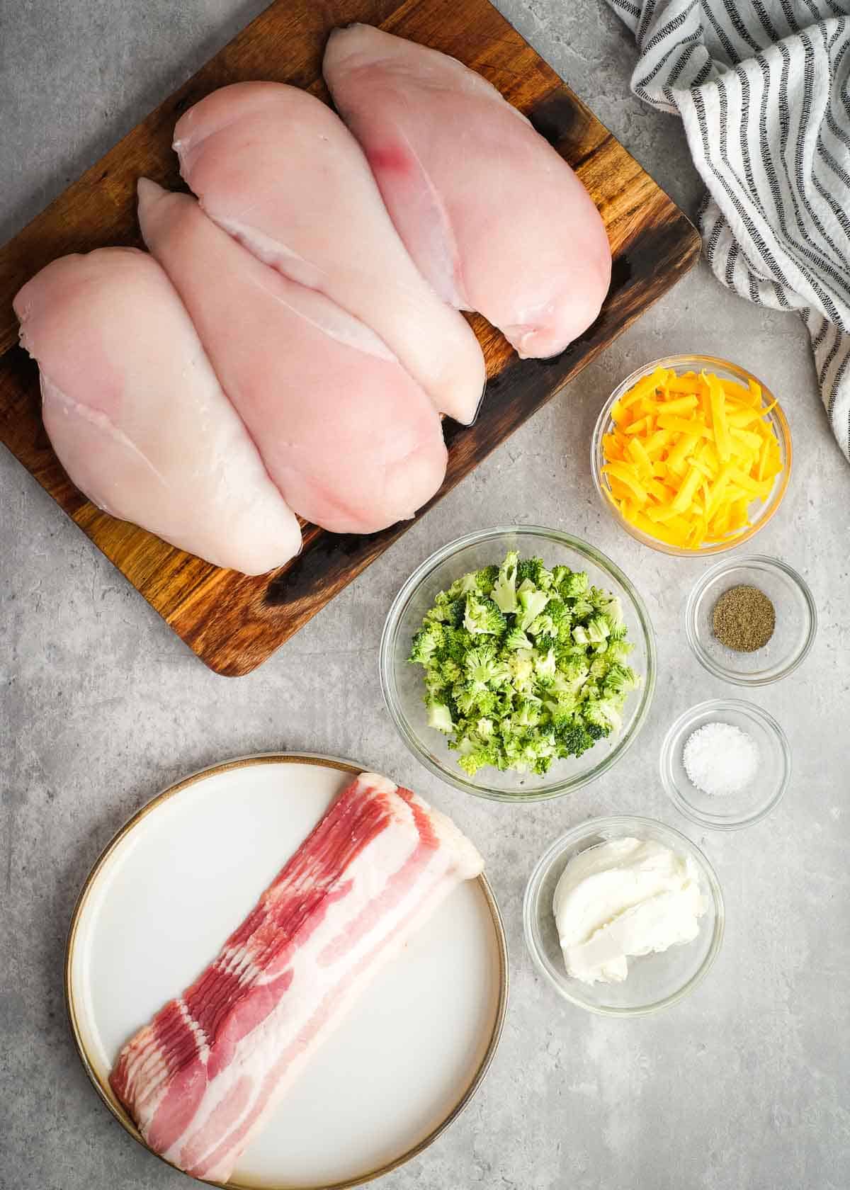 overhead image of bacon wrapped stuffed chicken breast ingredients