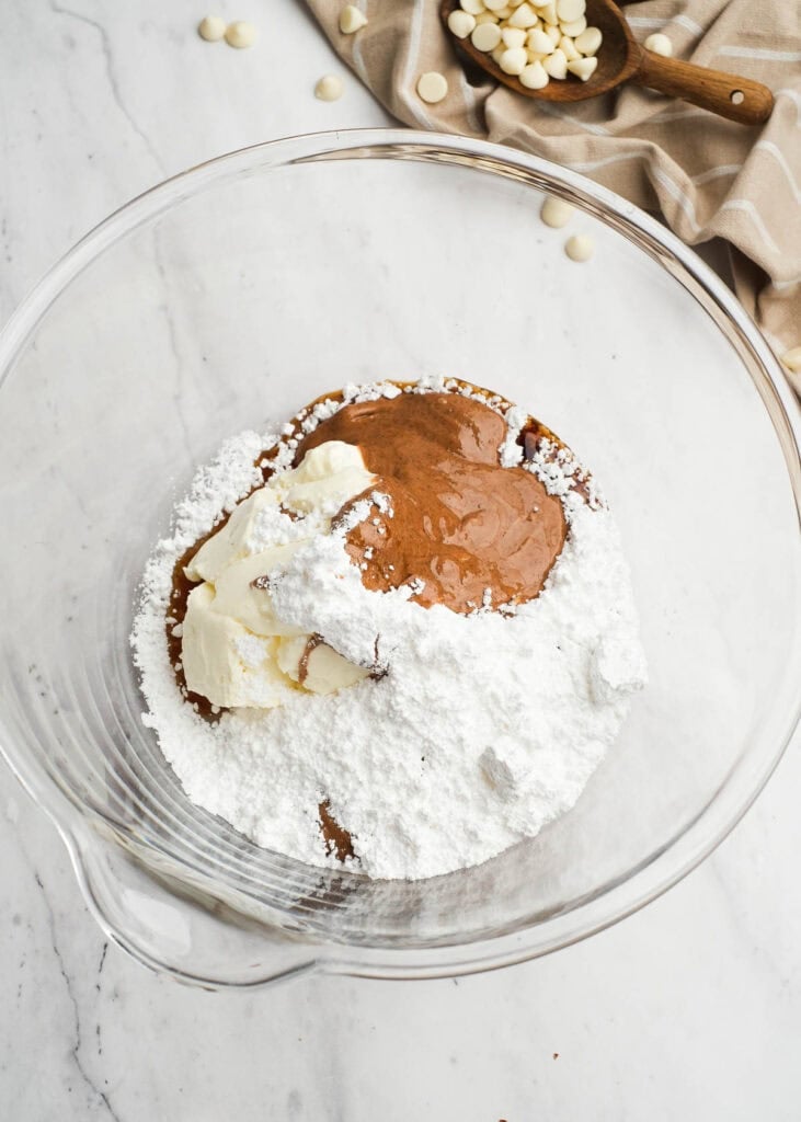 truffle filling ingredients in a clear mixing bowl