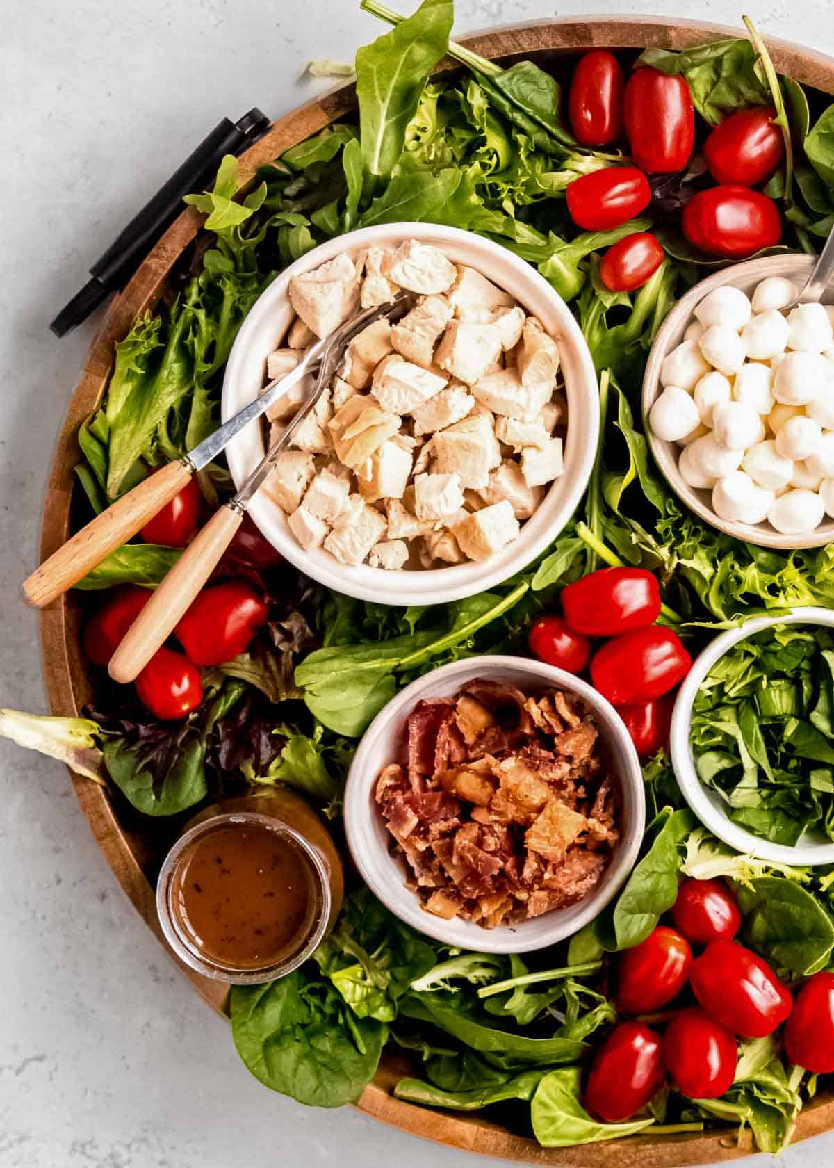overhead image of chicken caprese salad board