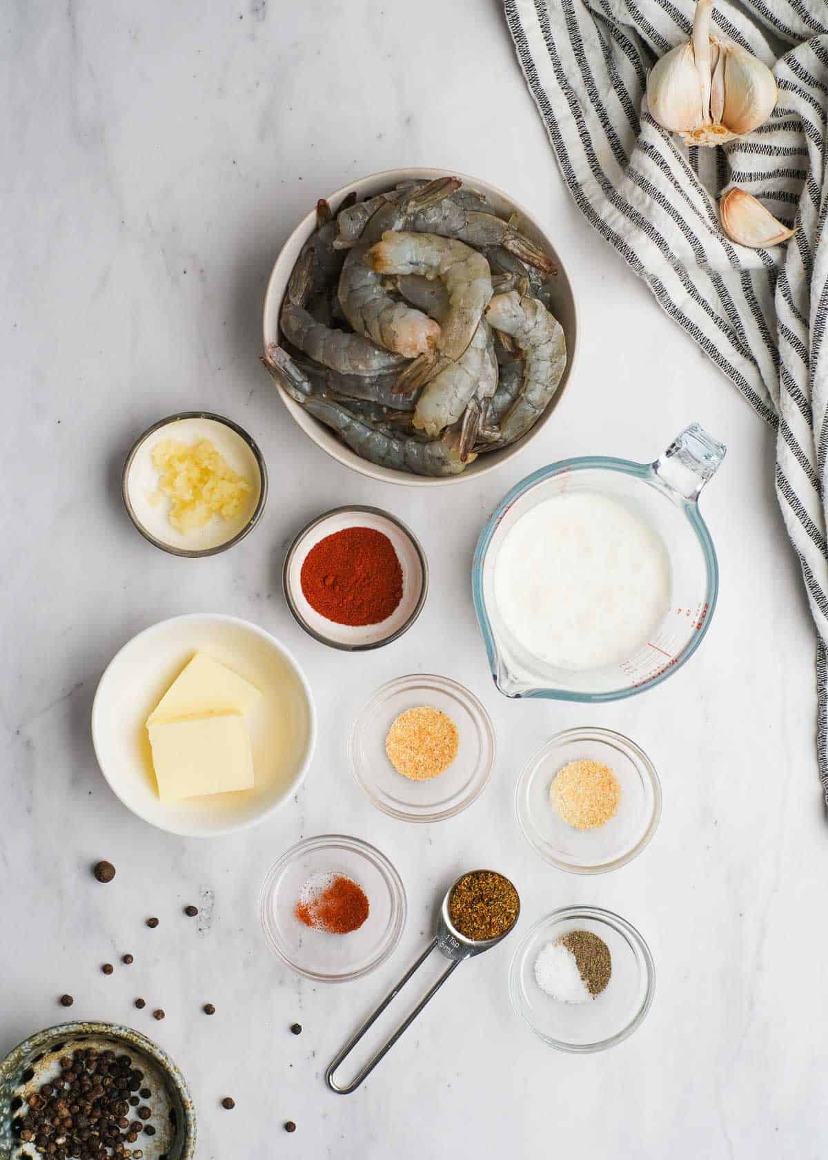 cajun shrimp ingredients on a white table