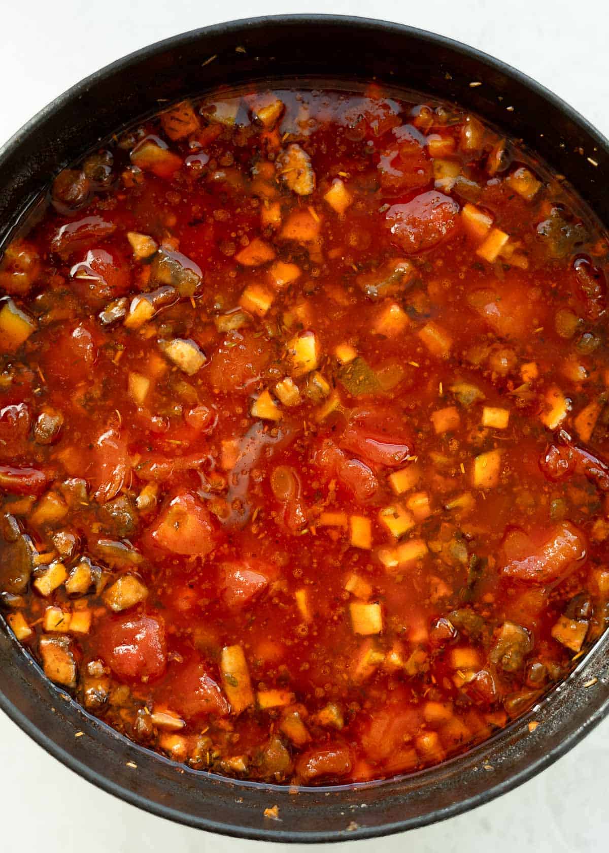 overhead image of pizza soup in dutch oven