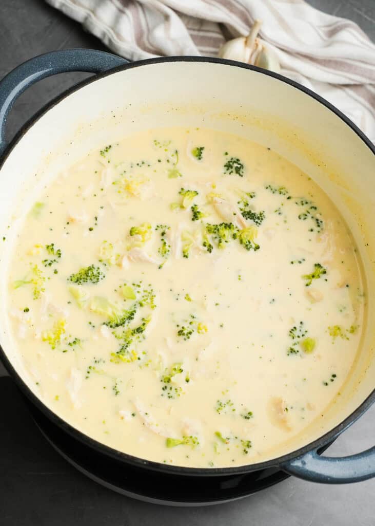 overhead image of broccoli cheddar soup after folding in the chicken