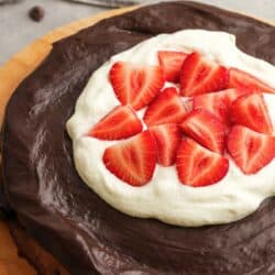 overhead image of death by chocolate cake on a wooden board