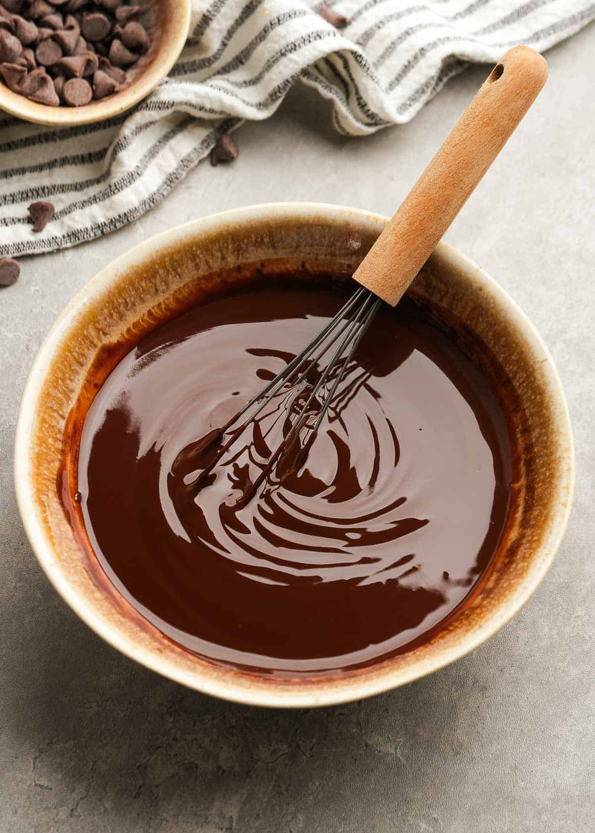 butter and chocolate chips being stirred after melting