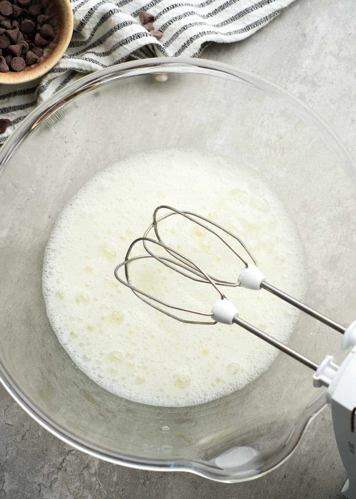 egg whites in a mixing bowl