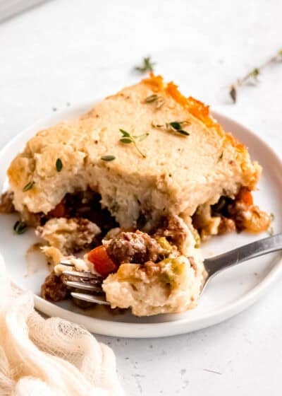 a bite of keto shepherd's pie being removed from plate with a fork
