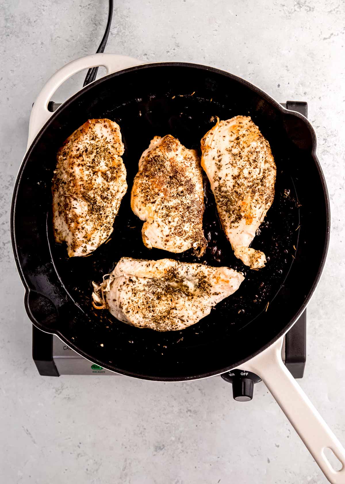 chicken breasts in cast iron skillet