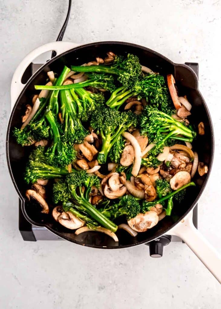 cooked vegetables in cast iron skillet