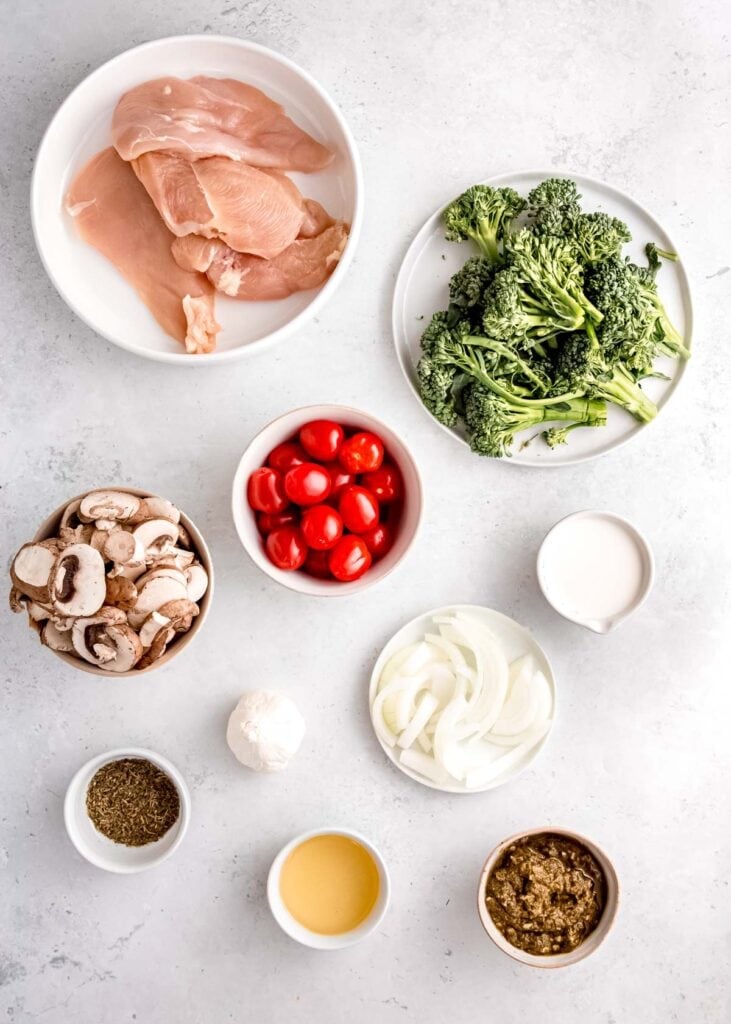pesto chicken skillet ingredients on a white table
