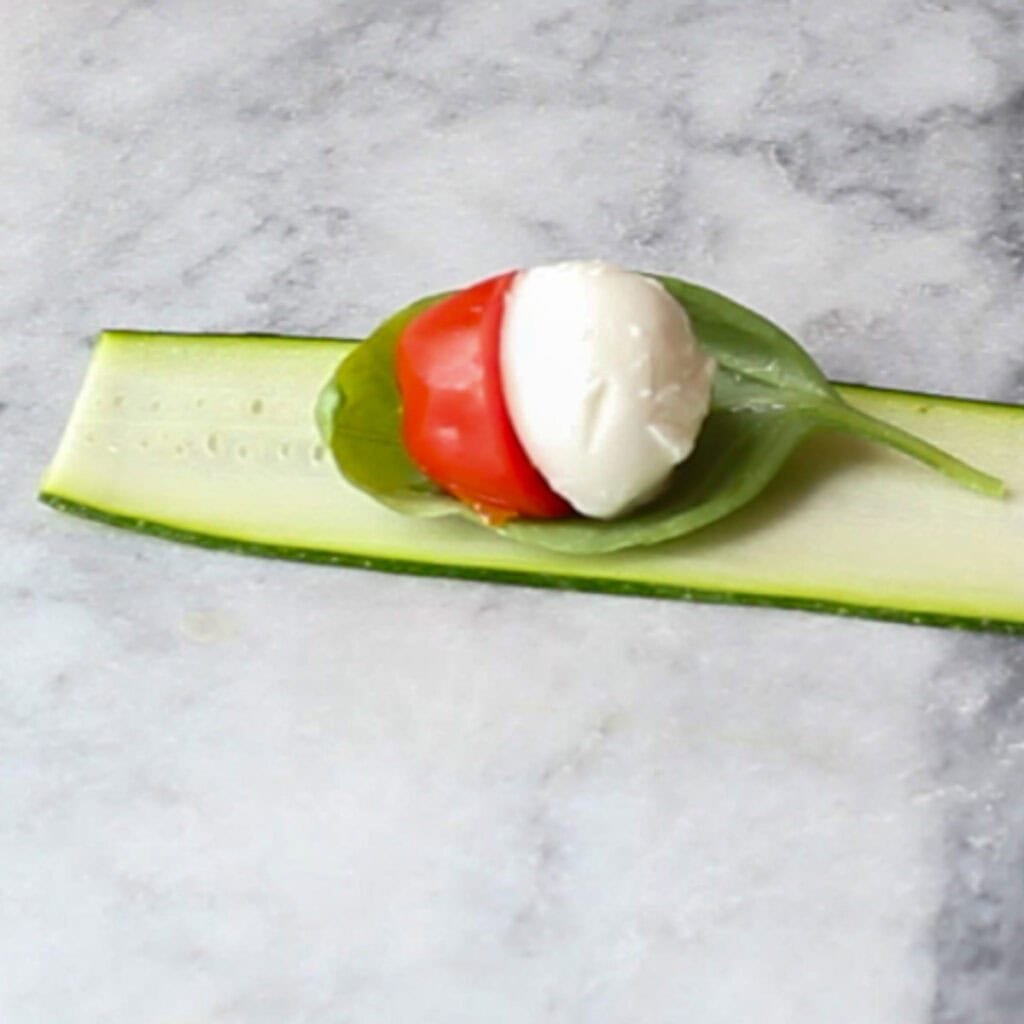 Caprese skewer prior to being rolled on counter top