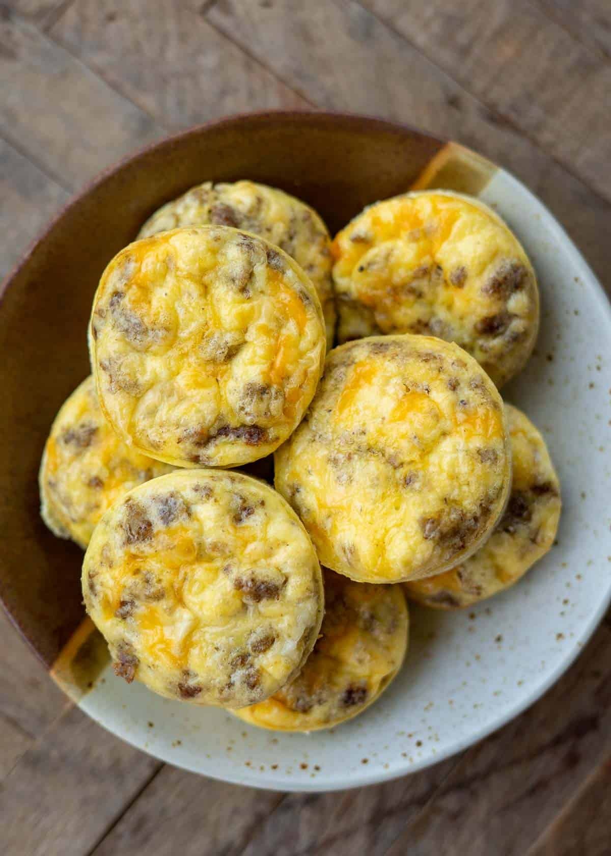 distant, overhead image of a stack of low carb sausage egg muffins