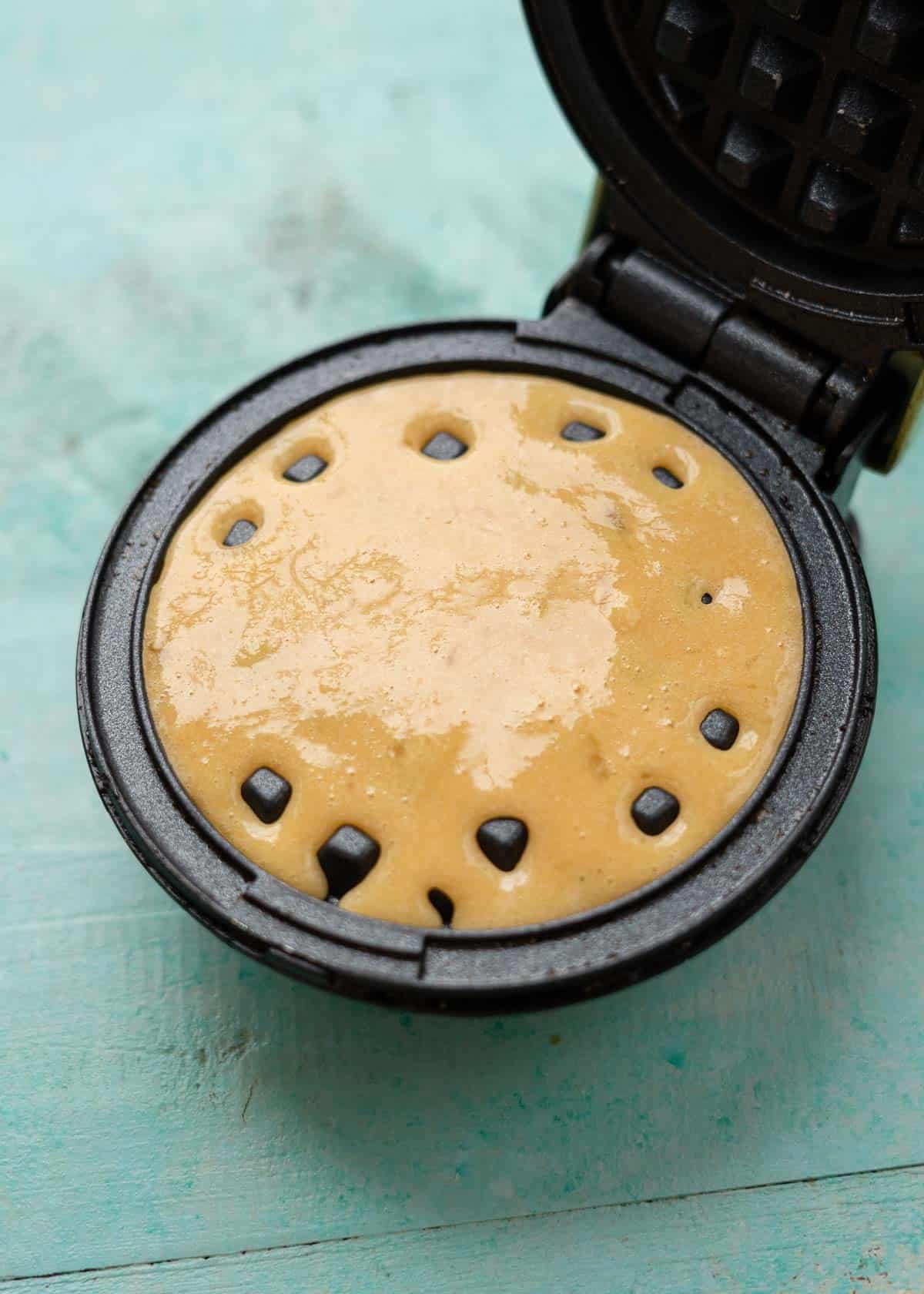 waffles batter in a waffle maker