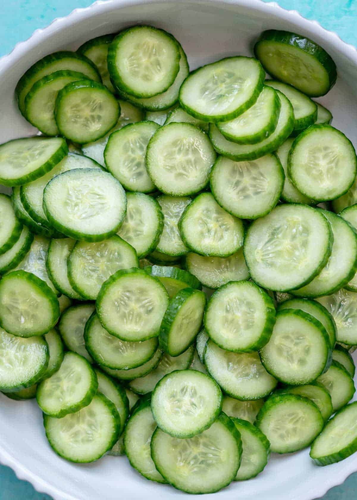 overhead image of sliced cucumbers
