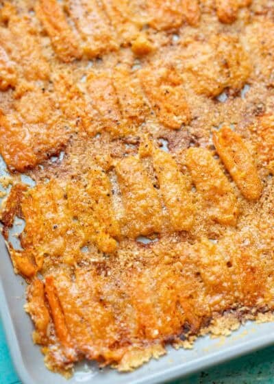 close up image of smashed carrots on sheet pan