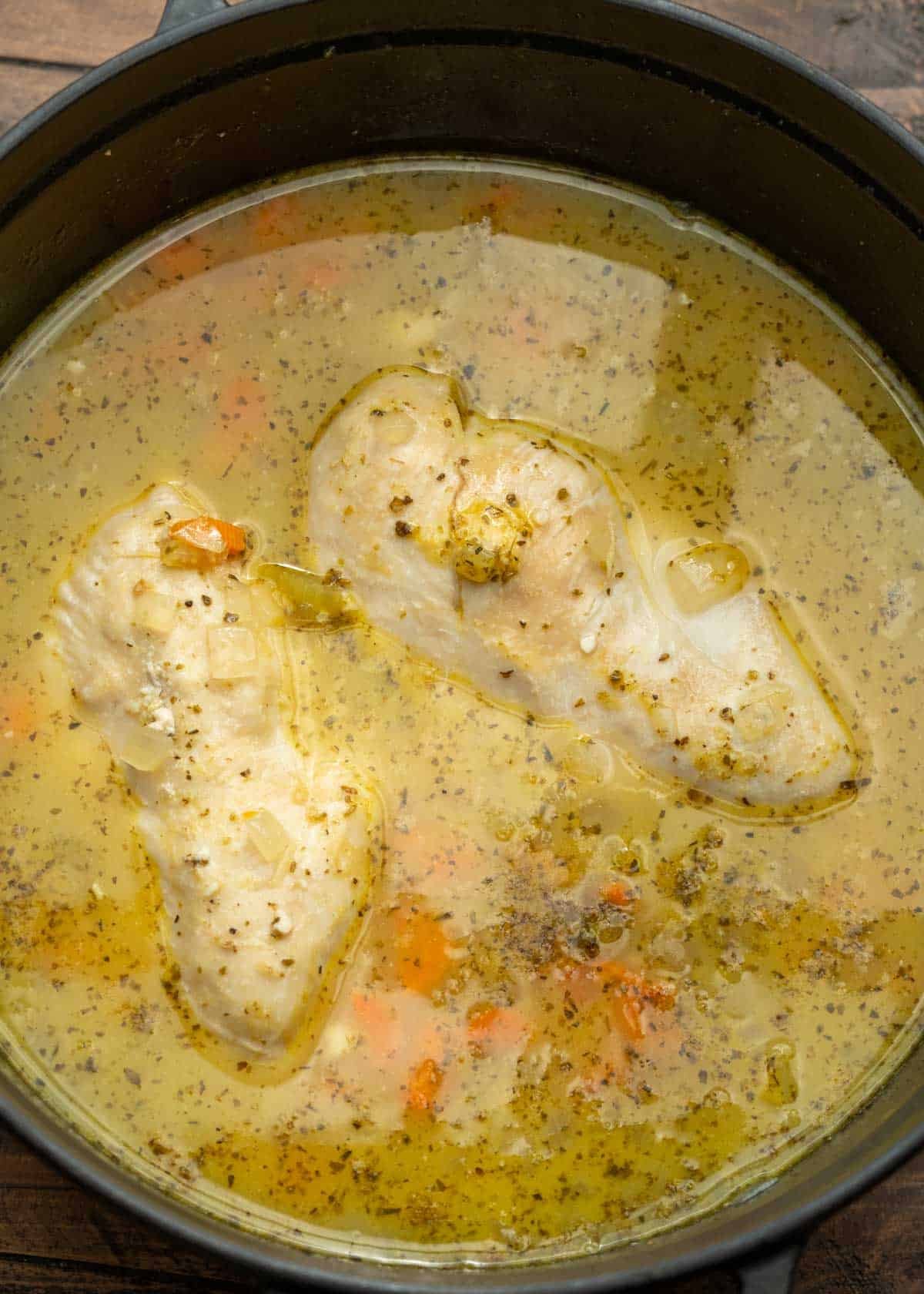 chicken in dutch oven once it is cooked and ready to shred