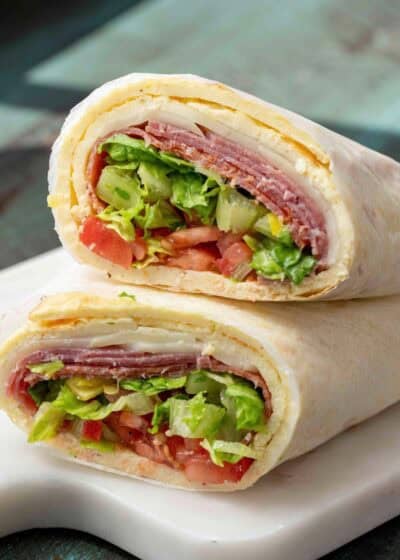 cottage cheese flatbread used as a wrap on white cutting board