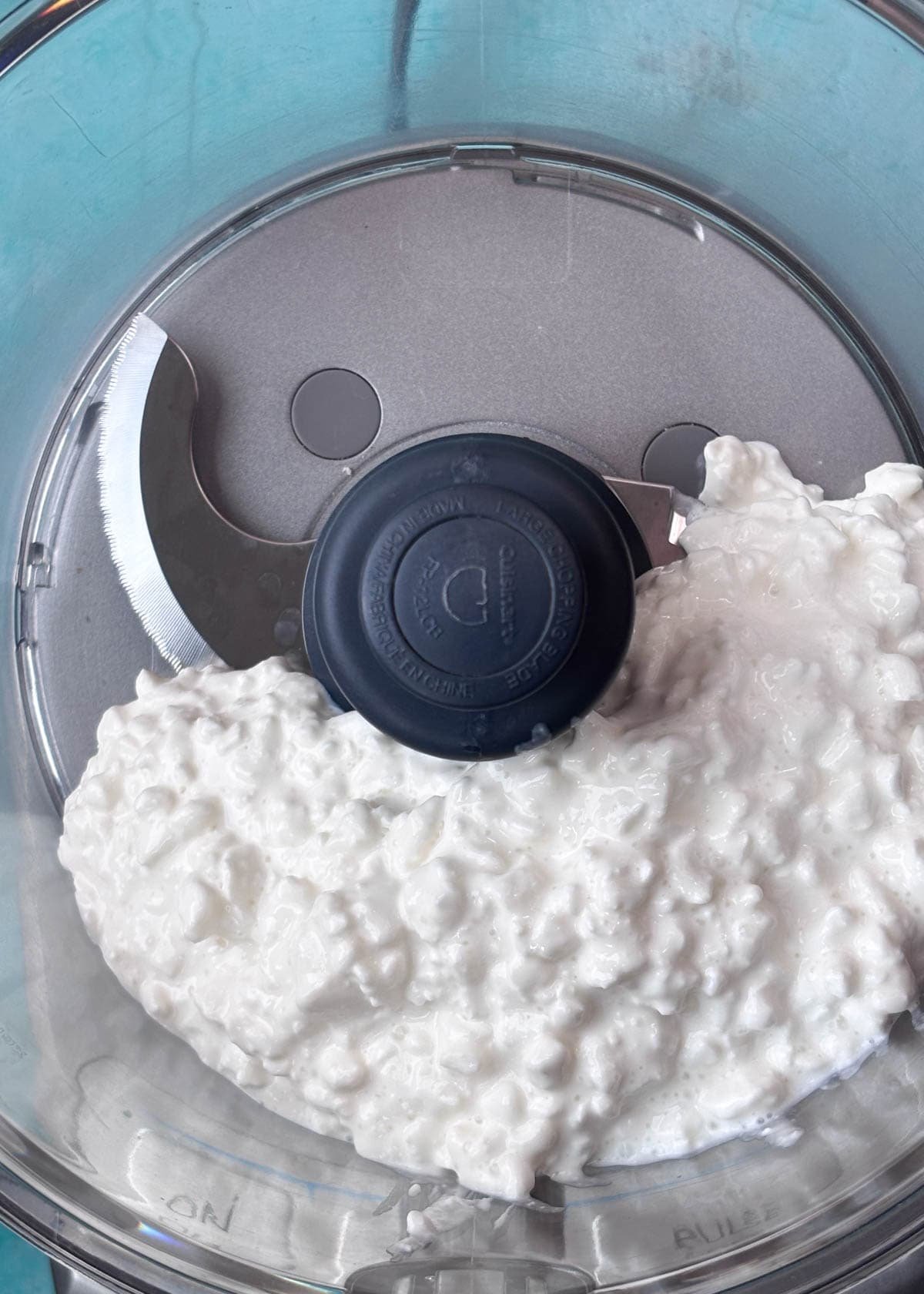 overhead image of cottage cheese in blender