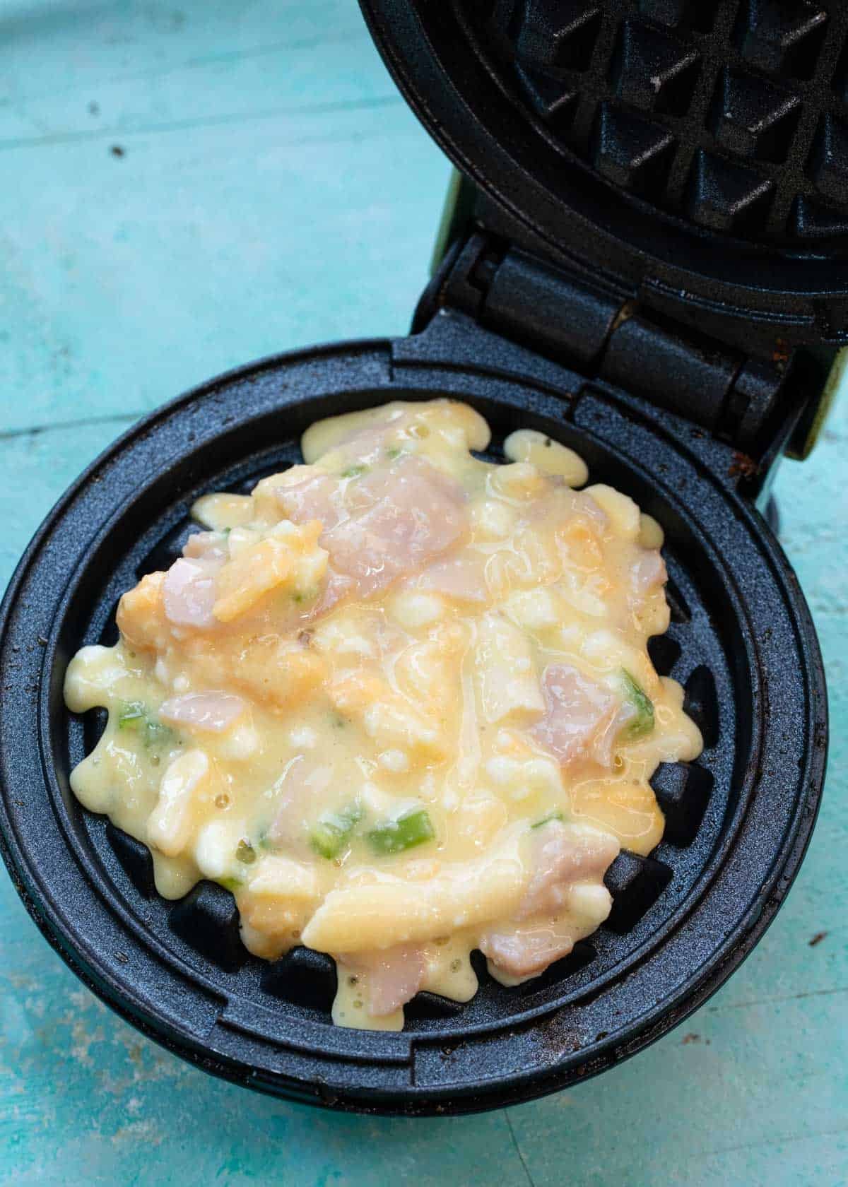 protein waffle batter in a waffle maker