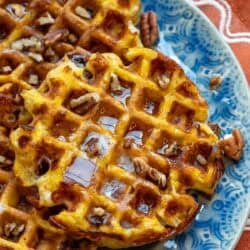 close up, overhead image of pumpkin chaffle on blue plate