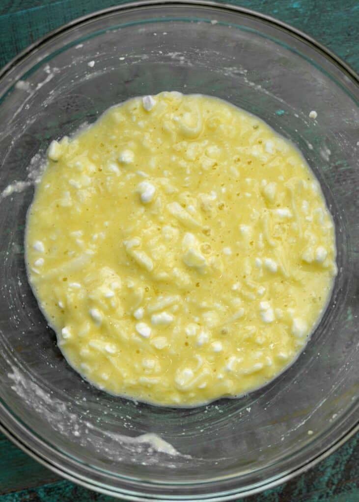 cottage cheese chaffle batter in a clear mixing bowl