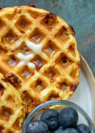 overhead image of cottage cheese chaffle on a white plate