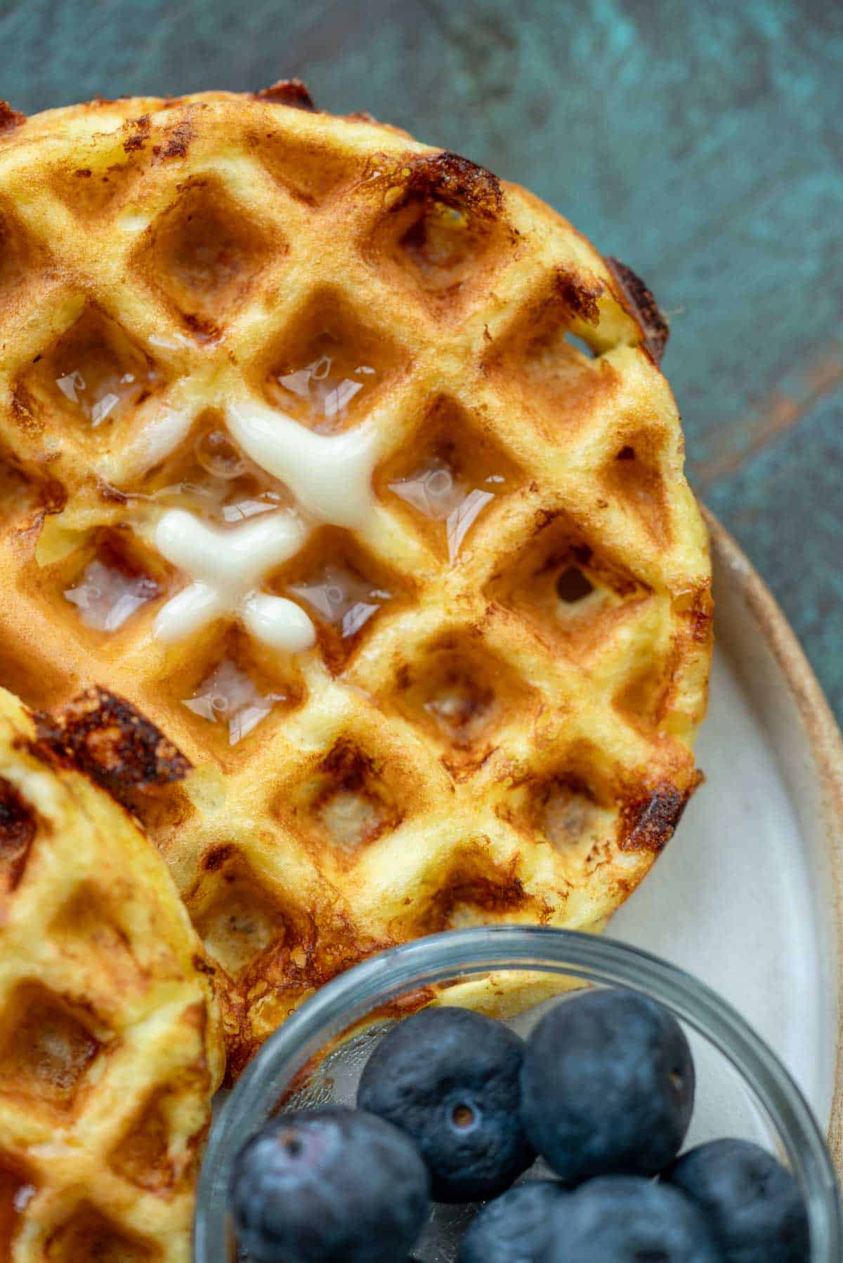 overhead image of cottage cheese chaffle on a white plate