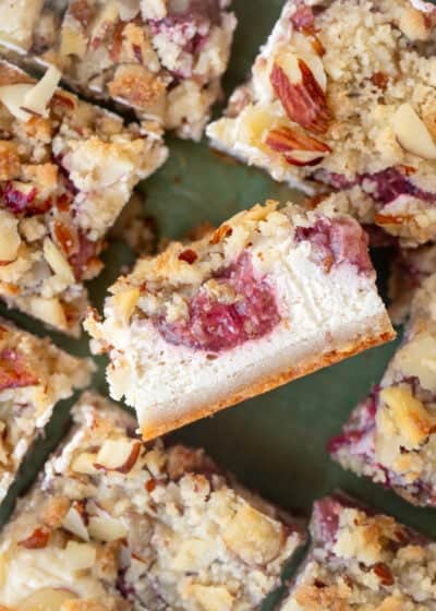 overhead image of sliced strawberry cheesecake bars
