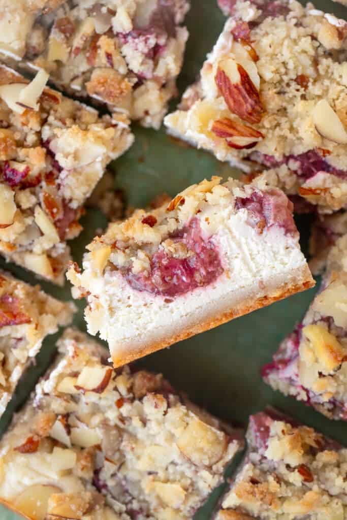 overhead image of sliced strawberry cheesecake bars