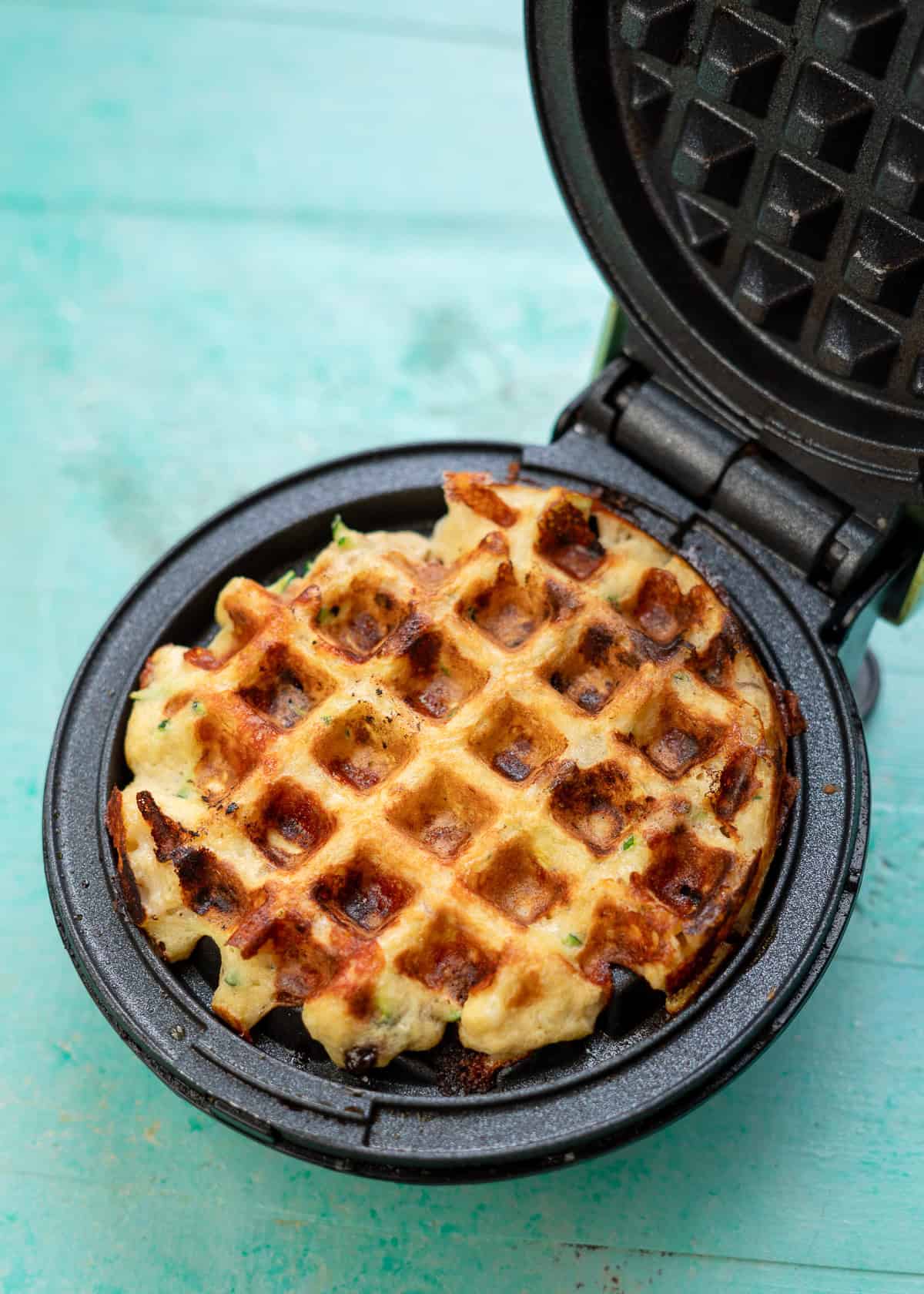 zucchini bread chaffle before being removed from waffle maker