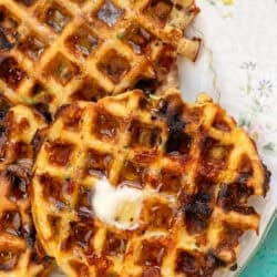 overhead image of zucchini bread chaffle on a white plate