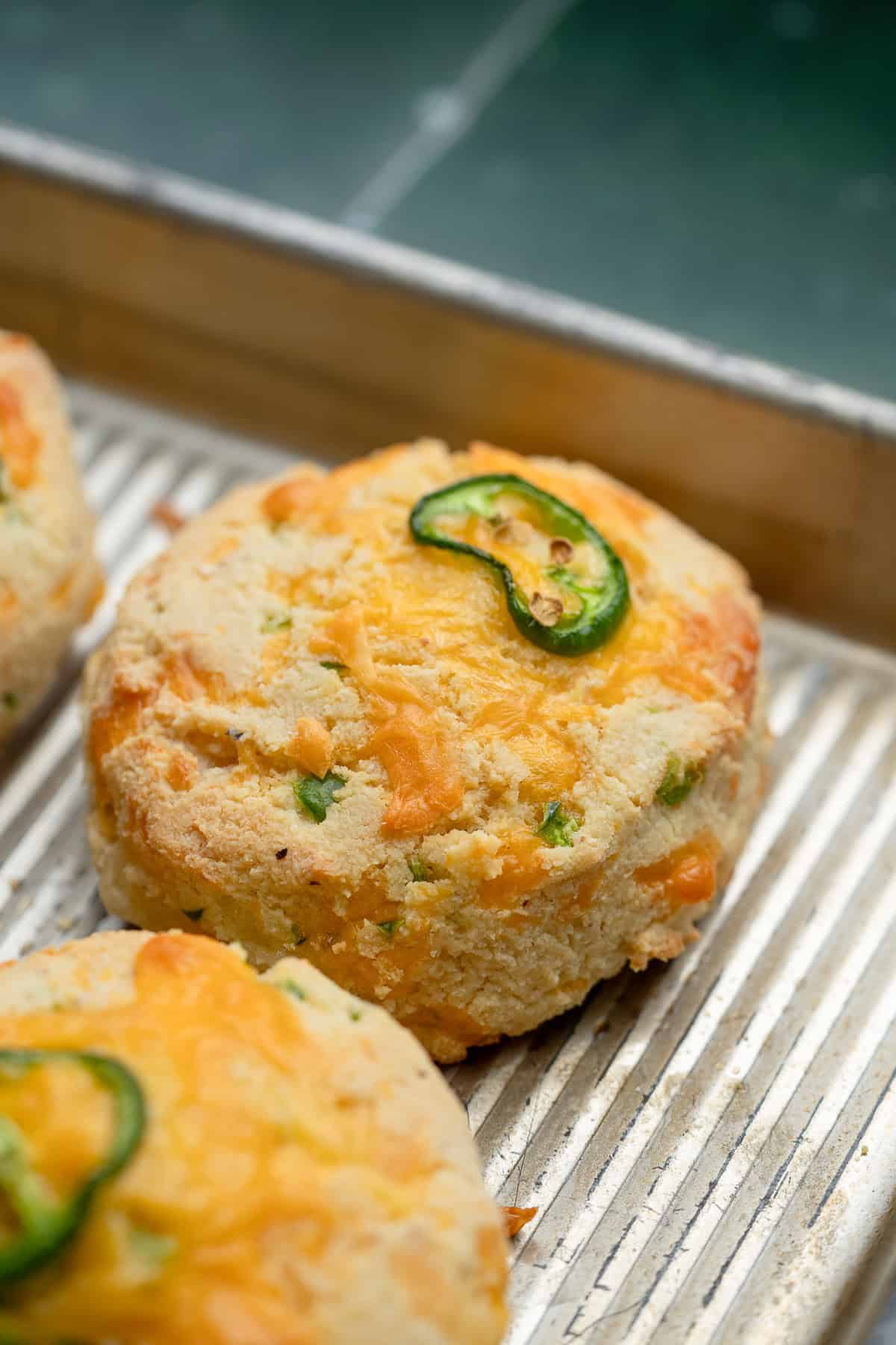 a single, cooked jalapeno cheddar biscuit