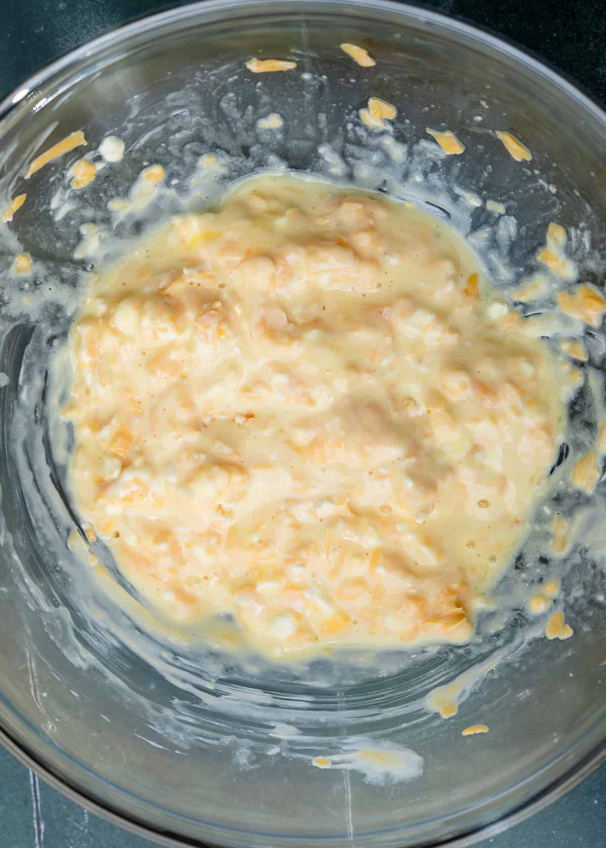 jalapeno cheddar biscuit mix in a clear mixing bowl